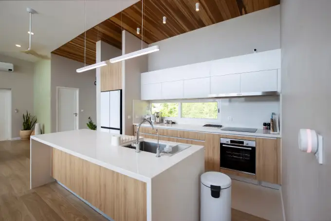 Custom island kitchen with European appliances